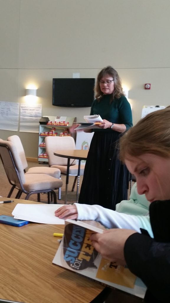 Erin Hill studying at Parker UMC youth gathering