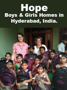 Photo of boys and girls with new backpacks, along with Shari Quackenbush and Marsha Weber