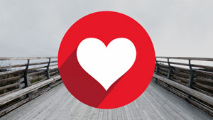 Bridge on cloudy day with heart logo