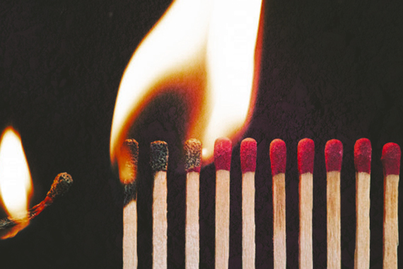 Row of matches being lit. The first few are burning–the rest are unlit but waiting to become engulfed in flame.