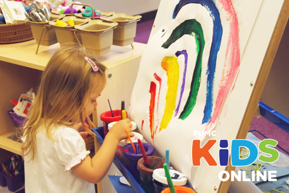 young-child-painting-color-rainbow-on-easel