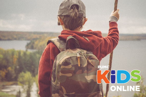 young-boy-hiking-overlooking-lake-wearing-cap-red hoodie-backpack